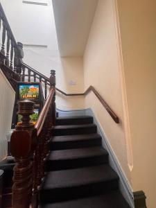 a flight of stairs with a television on the top at The Leopold Hotel in Ararat +4 photos