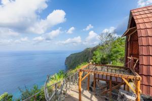 a view of the ocean from a house at Suwehan Rey Cliff House in Nusa Penida