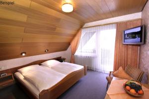 Postel nebo postele na pokoji v ubytování Gasthaus Seehof + 22 fotografií