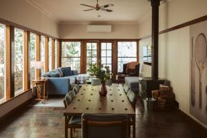 a living room with a couch and a table in a room at Warburton Stays Grand View in Warburton
