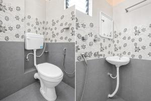 a bathroom with a toilet and a sink at Hotel O Bhubaneswar New Station Road in Bhubaneshwar