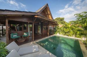 an image of a villa with a swimming pool at Kalyana Villa Gili Air in Gili Islands