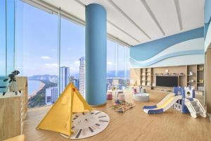 a childrens play room with a large window at Hyatt Regency Nha Trang in Nha Trang