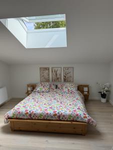 a bed in a white room with a window at L'Escapade Caramanaise in Caraman +34 photos