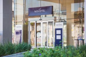 a building with a sign on the front of it at Novotel RJ Porto Atlantico in Rio de Janeiro