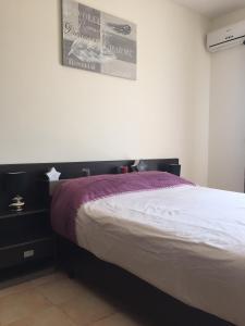 Postel nebo postele na pokoji v ubytování Appartement Saidia Méditerranée
