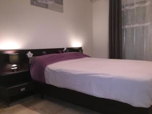 Postel nebo postele na pokoji v ubytování Appartement Saidia Méditerranée