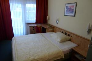 Postel nebo postele na pokoji v ubytování Hotel Ring Park