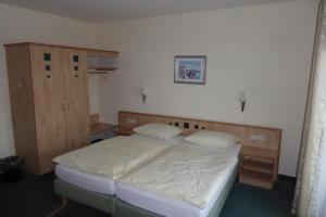 Postel nebo postele na pokoji v ubytování Hotel Ring Park