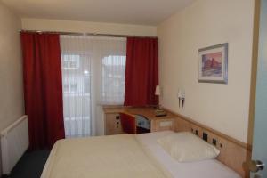Postel nebo postele na pokoji v ubytování Hotel Ring Park