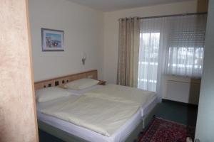 Postel nebo postele na pokoji v ubytování Hotel Ring Park
