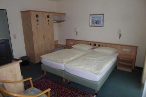 Postel nebo postele na pokoji v ubytování Hotel Ring Park
