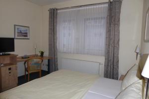 Postel nebo postele na pokoji v ubytování Hotel Ring Park