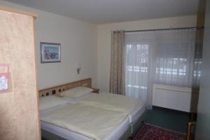 Postel nebo postele na pokoji v ubytování Hotel Ring Park