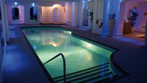 a large swimming pool in a hotel room at The Victoria Hotel in Sidmouth