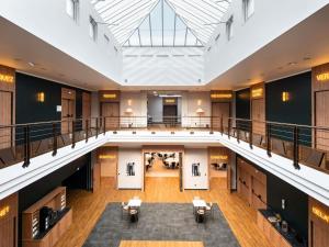 an image of the lobby of a building with a skylight at Mercure Chantilly Resort & Conventions in Chantilly +52 photos