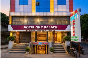 a hotel sky palace with stairs in front of it at Hotel Sky Palace Airport Zone in Hyderabad