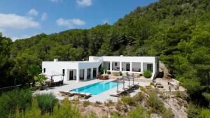 an image of a house with a swimming pool at Villa Arenas in Sant Josep de sa Talaia