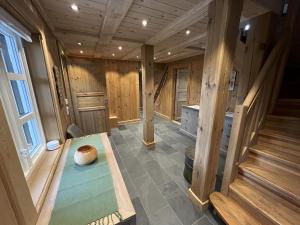 an inside view of a room with wooden walls at Cozy Cabin With Ski Trail Access in Beitostøl