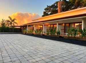 a building with a patio in front of it at The sonteng hills in Sengkol