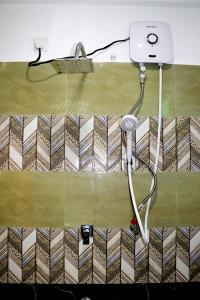 a bath room with a shower with at Nature Beat villa in Mirissa