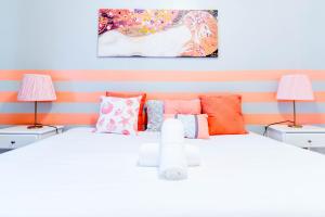 Cama o camas de una habitación en Ocean walk apartments