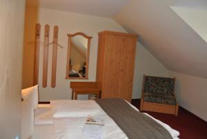 Postel nebo postele na pokoji v ubytování AKZENT Hotel Am Bach