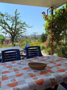 a table with a bowl on top of it at Sea Panorama in Karolino-Buhaz