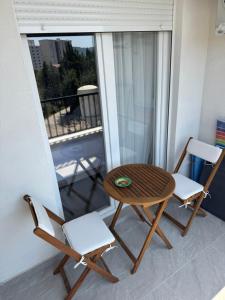 a table and two chairs on a balcony at Lovely apartmant Bar in Bar