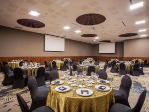 a conference room with tables and chairs and whiteboards at Armony Marival Resort & Spa Punta de Mita - MGallery collection in Punta Mita +239 photos
