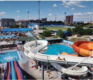 a large water park with a water slide at VukaNest apartman Jagodina in Jagodina
