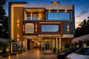 a building with a sign that reads smart international at Hotel Smart International in New Delhi