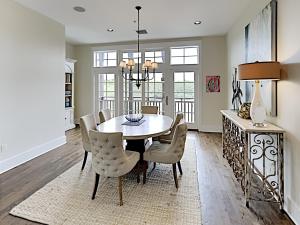 a dining room with a table and chairs at Eastern Lake Village #E - Just 4 Fun in Seagrove Beach