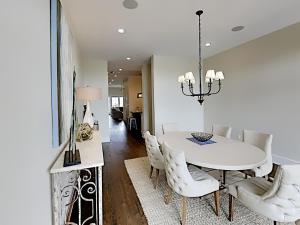 a dining room with a white table and white chairs at Eastern Lake Village #E - Just 4 Fun in Seagrove Beach +20 photos