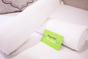 Postelja oz. postelje v sobi nastanitve Smiley Inn