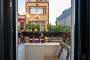 a balcony with a view of a building at HOPEFULL HOTEL in Istanbul