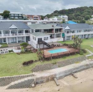 an aerial view of a house with a swimming pool at Kei Sands Nr 6 in Kei-mouth Village