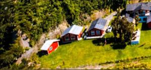 an aerial view of a group of houses in a field at Cabañas El Rincon del Sur in Colaco