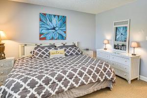 a bedroom with a bed and two night stands at Boat Dock, Slips & Pool! St Johns River Condo in Welaka +19 photos