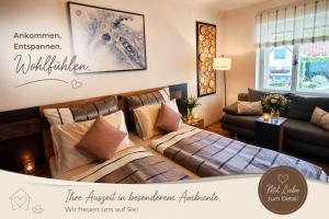a living room with two couches and a couch at FERIENHAUS Weinviertel in Pernersdorf