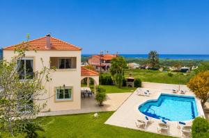 an image of a villa with a swimming pool at Villa Maia in Rhodes Town