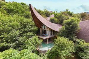 an overhead view of a house in the trees at Garrya Mù Cang Chải in Mù Cang Chải +181 photos