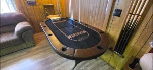 a wooden table in the corner of a room at 4 River Lake Sea in Parker