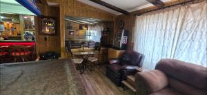 a living room with a couch and a table at 4 River Lake Sea in Parker