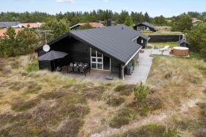 an aerial view of a house on a hill at 1005-Thisted-Spanggardsvej-39 in Torsted