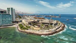 an aerial view of a resort in the ocean at Centro Vista Al Mar san Martin Coliving in Antofagasta