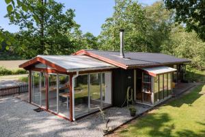 a house with a pitched roof and windows at HA378-Saeby-Krebsevej-2 in Sæby