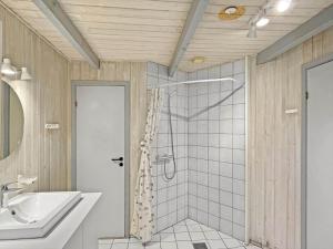a bathroom with a shower and a sink at 0048-Romo-Trinnesvej-12 in Høm +18 photos
