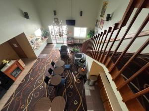 arial view of a church with a table and chairs at Deluxe Inn Hotel in Nebraska City in Nebraska City