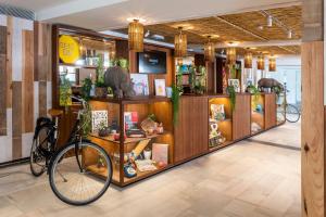 a bike is parked in a store lobby at INNSiDE by Meliá Alcudia in Port d'Alcudia